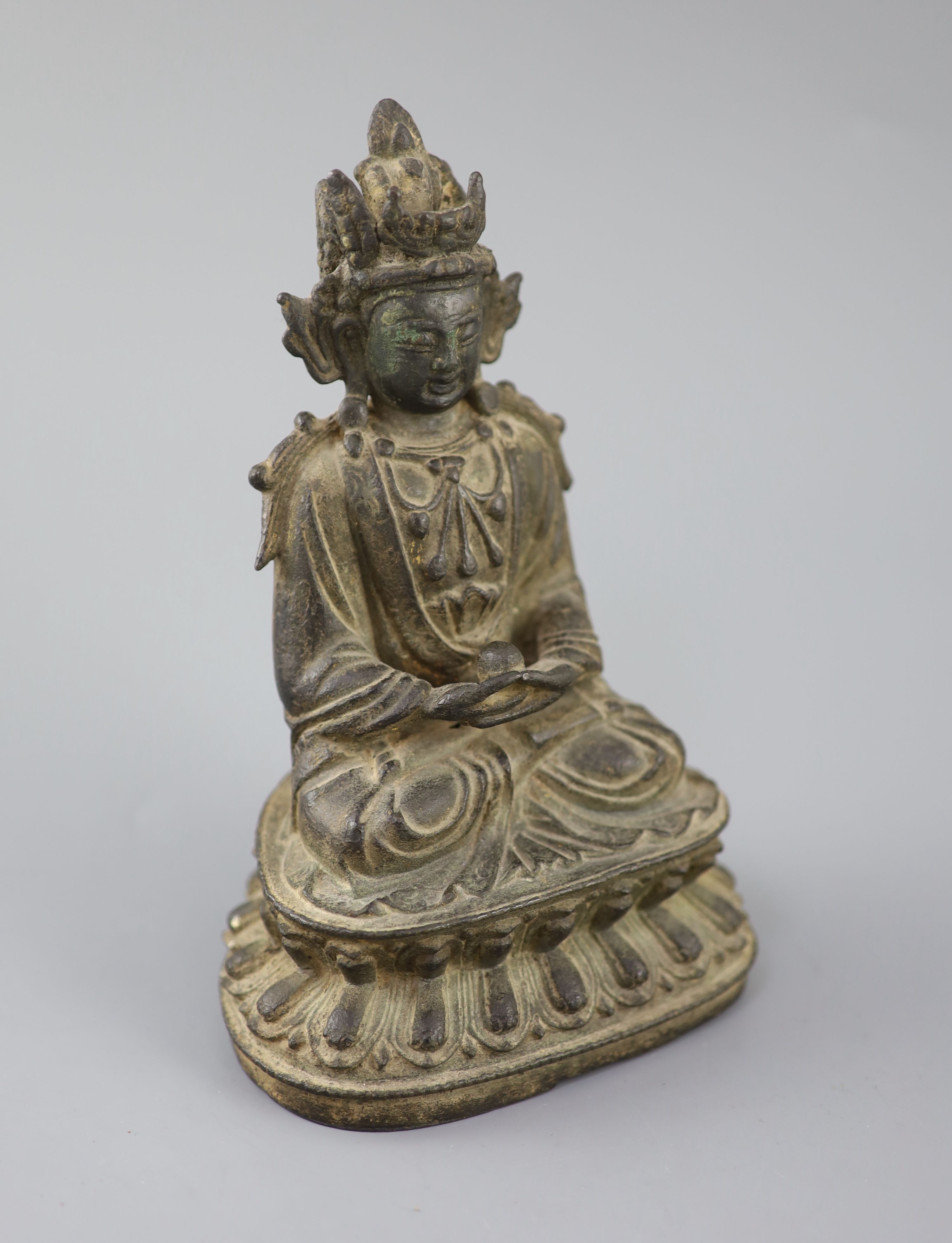 A Chinese bronze figure Amitayus, 17th century, 20cm high, losses to crown